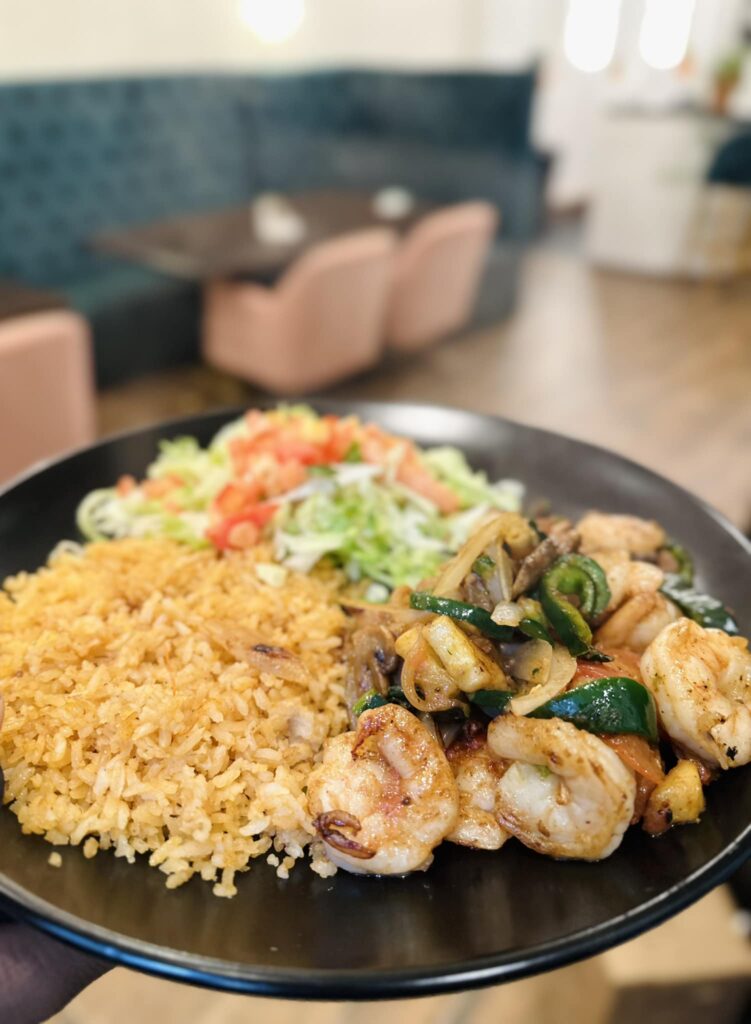 Sautéed shrimp- Chef Arturo’s seasoned grilled shrimp sautéed w/zucchini,mushrooms,tomatoes,onions and poblano peppers. Served with rice and a side of lettuce with diced tomatoes